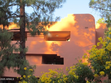 Step into this open and bright condo that blends warmth and