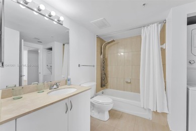 High-floor 1BD/1BA condo at Opera Tower with expansive