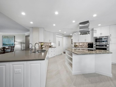 This exceptional 3-bedroom, 3.5-bathroom + family room residence