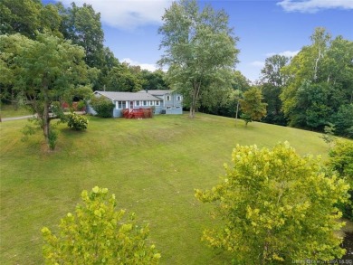 This 6 bedroom, 2 full bath home sits on 3.92 acres of peaceful