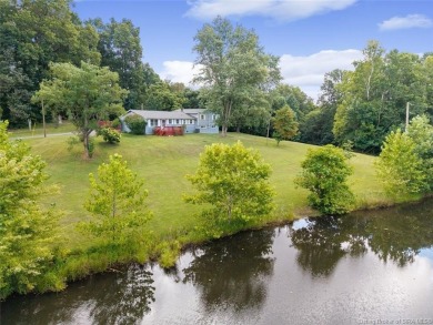 This 6 bedroom, 2 full bath home sits on 3.92 acres of peaceful