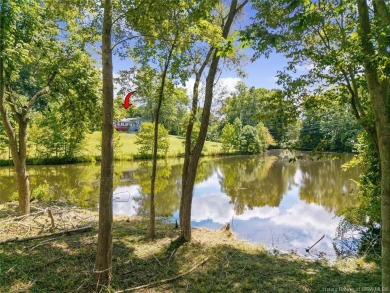This 6 bedroom, 2 full bath home sits on 3.92 acres of peaceful