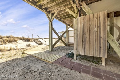 Experience the ultimate coastal escape at 244 Sea Shore Drive -