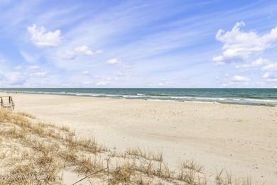 Experience the ultimate coastal escape at 244 Sea Shore Drive -