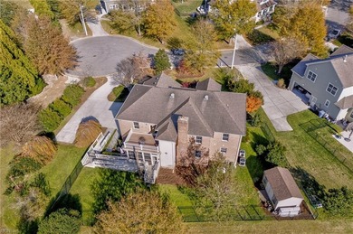 Beautifully maintained 5-bedroom, 4.5-bath all-brick home with