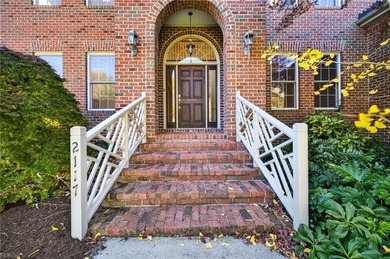 Beautifully maintained 5-bedroom, 4.5-bath all-brick home with