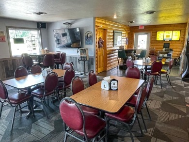 NORTHWOOD'S WATERFRONT BUSINESS OPPORTUNITY. Consists of a