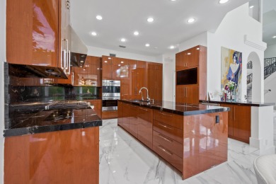 Experience breathtaking long lake views from this grand estate