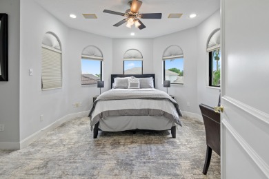 Experience breathtaking long lake views from this grand estate