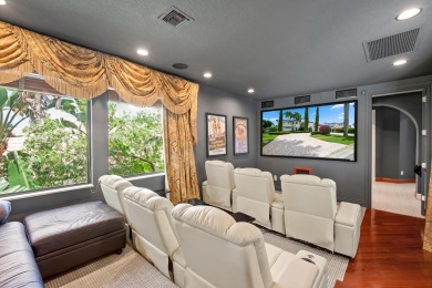 Experience breathtaking long lake views from this grand estate