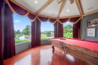 Experience breathtaking long lake views from this grand estate