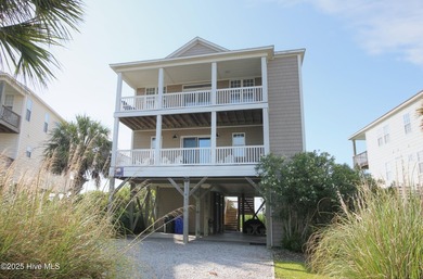 This meticulously maintained four-bedroom, three-bath waterfront