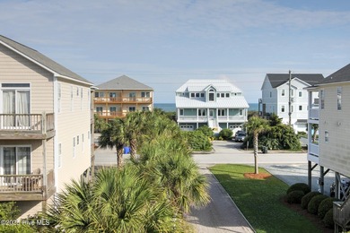 This meticulously maintained four-bedroom, three-bath waterfront