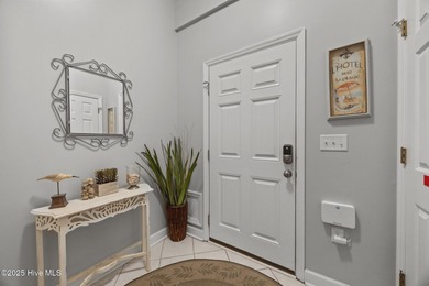 This meticulously maintained four-bedroom, three-bath waterfront