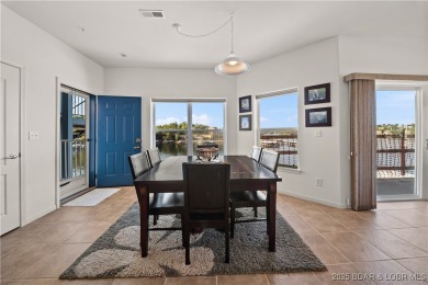 Experience lake living at its finest with this beautifully