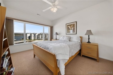 Experience lake living at its finest with this beautifully