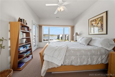 Experience lake living at its finest with this beautifully