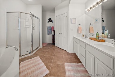 Experience lake living at its finest with this beautifully