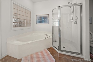 Experience lake living at its finest with this beautifully