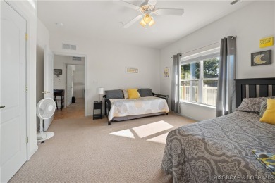 Experience lake living at its finest with this beautifully