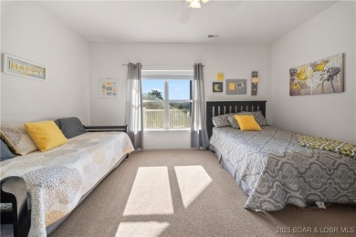 Experience lake living at its finest with this beautifully