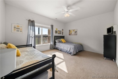 Experience lake living at its finest with this beautifully