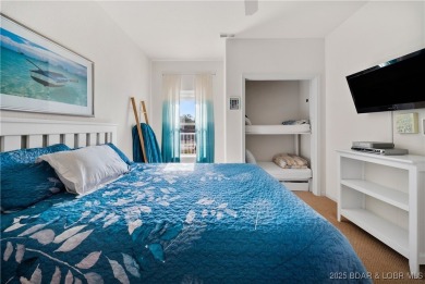 Experience lake living at its finest with this beautifully