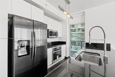Bright and spacious 2-bed, 2-bath corner unit at Axis on