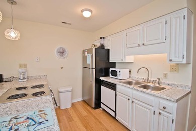 Rarely available OCEANFRONT condo in the gated Queens Court