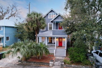 This exquisite Victorian home, complete with double porches, has
