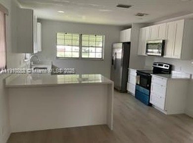 Totally remodeled 2/2 villa in a desirable 55+ community! Very