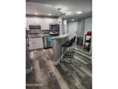 DON'T MISS THIS beautifully furnished & totally updated spacious