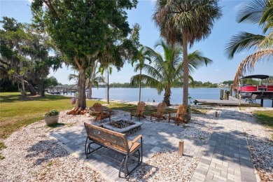 Sweeping Caloosahatchee River views, a private dock with lift