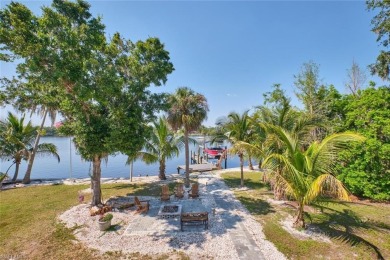 Sweeping Caloosahatchee River views, a private dock with lift