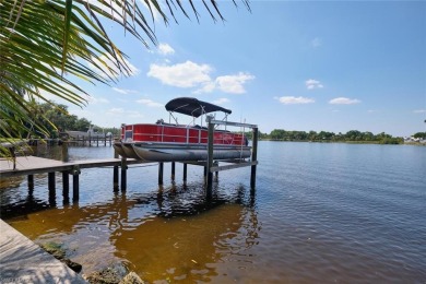 Sweeping Caloosahatchee River views, a private dock with lift