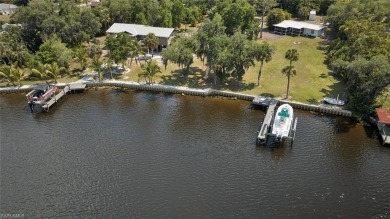 Sweeping Caloosahatchee River views, a private dock with lift