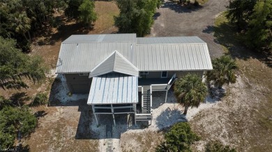 Sweeping Caloosahatchee River views, a private dock with lift