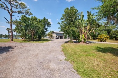 Sweeping Caloosahatchee River views, a private dock with lift