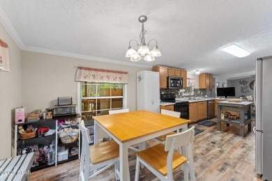 Nestled at the end of a quiet paved cul-de-sac, this spacious