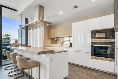 Experience elevated living in PH 5807. This corner 3BR, 3.5BA