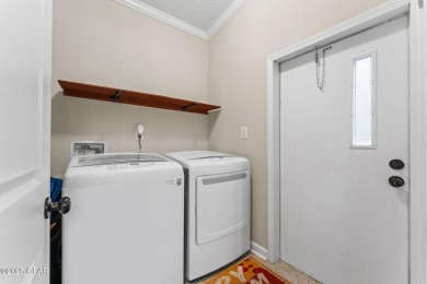 Nestled at the end of a quiet paved cul-de-sac, this spacious