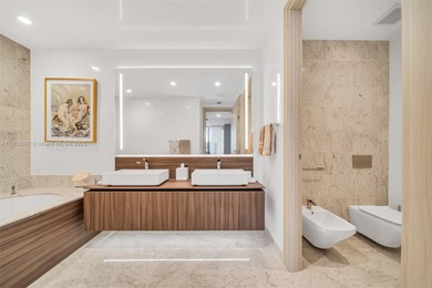 Experience elevated living in PH 5807. This corner 3BR, 3.5BA