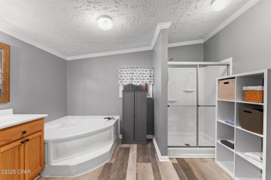 Nestled at the end of a quiet paved cul-de-sac, this spacious