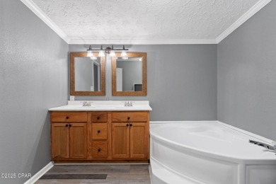 Nestled at the end of a quiet paved cul-de-sac, this spacious