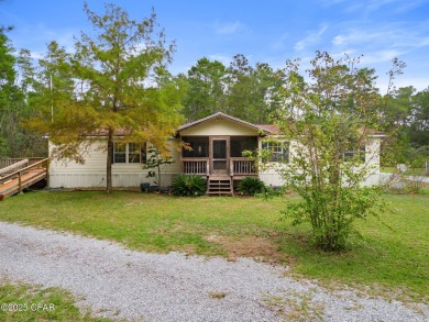 Nestled at the end of a quiet paved cul-de-sac, this spacious