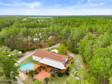 Nestled at the end of a quiet paved cul-de-sac, this spacious