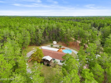 Nestled at the end of a quiet paved cul-de-sac, this spacious