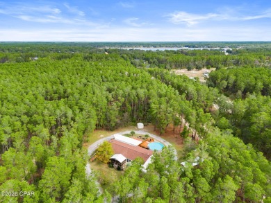 Nestled at the end of a quiet paved cul-de-sac, this spacious