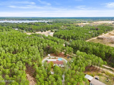 Nestled at the end of a quiet paved cul-de-sac, this spacious