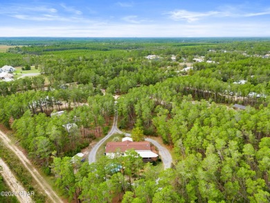 Nestled at the end of a quiet paved cul-de-sac, this spacious